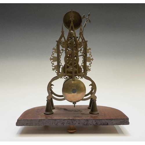 2909 - A brass cathedral skeleton clock, 20th century, with single fusee movement, striking on a bell, maho... 