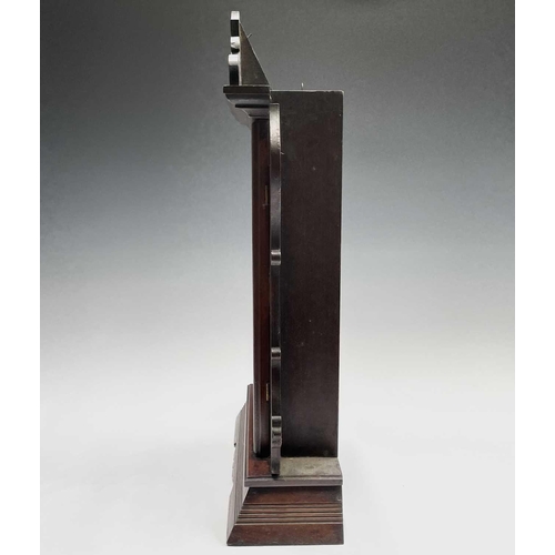 2911 - An American mantel alarm clock, by Seth Thomas, late 19th century, the walnut case with carved sides... 