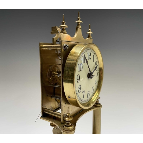 2912 - A 400 day brass torsion clock, by Gustav Becker, the white enamel dial with Arabic numerals, the mov... 