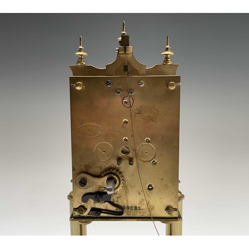 2912 - A 400 day brass torsion clock, by Gustav Becker, the white enamel dial with Arabic numerals, the mov... 