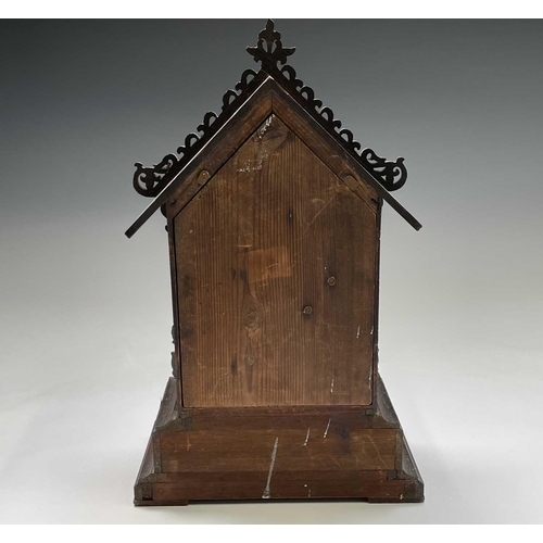 2915 - An oak and pine Black Forest cuckoo mantel clock, circa 1900, the case with carved and pierced decor... 