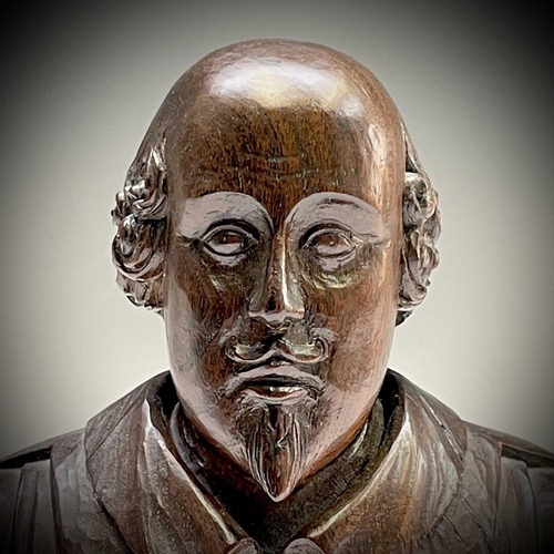 292 - A carved mulberry wood bust of Shakespeare, the reverse carved 'Mulberry wood from New Place Stratfo... 