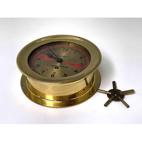 2921 - A U.S. Maritme Commision ship's radio room clock, by The Chelsea Clock Co, Boston, the brass dial wi... 