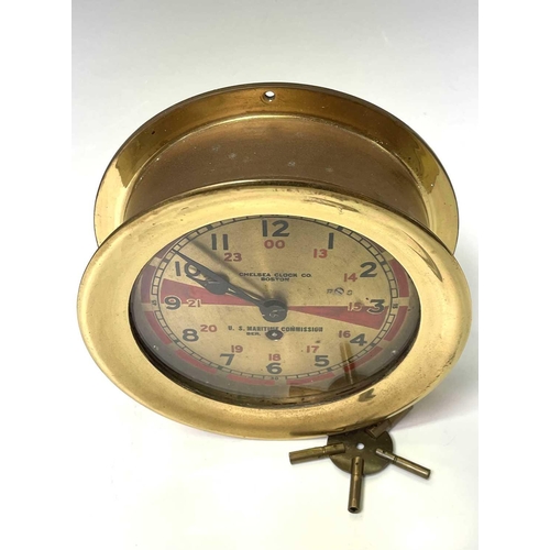 2921 - A U.S. Maritme Commision ship's radio room clock, by The Chelsea Clock Co, Boston, the brass dial wi... 