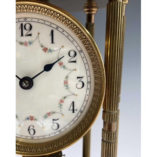 2928 - A 400 day brass torsion mantel clock, of portico type, with domed top, floral garland decorated dial... 