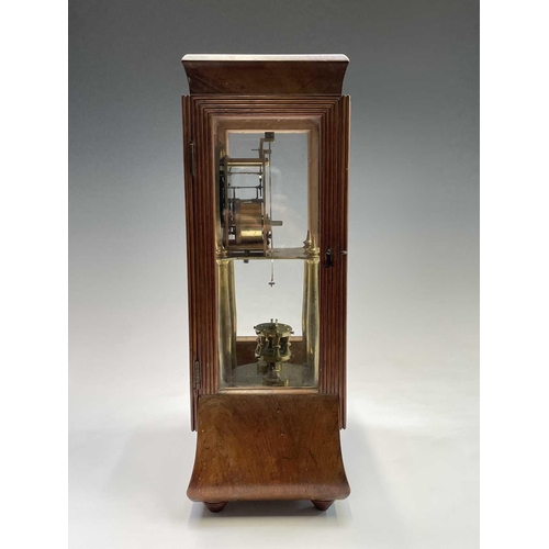 2929 - A walnut cased 400 day torsion clock, circa 1920, the brass framed circular copper dial with blue an... 