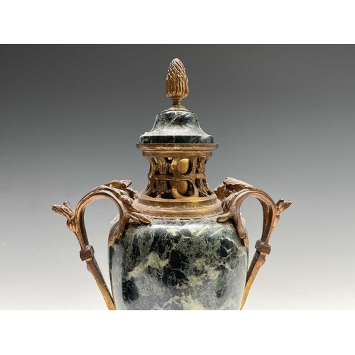 293 - A pair of French ormolu mounted green marble urns and covers, in the Louis XV style, circa 1900, the... 