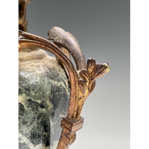 293 - A pair of French ormolu mounted green marble urns and covers, in the Louis XV style, circa 1900, the... 