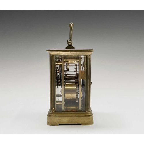 2930 - A French brass repeating carriage clock, circa 1900, with white enamel dial, striking on a coiled go... 