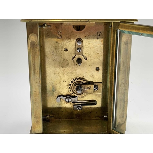 2933 - A French brass cased carriage clock, early 20th century, on turned feet, height 12.5cm.