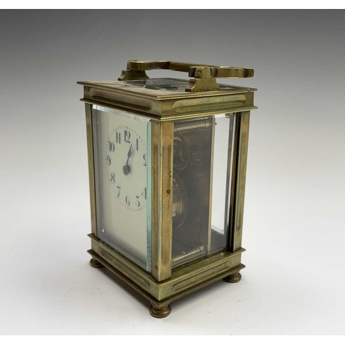 2933 - A French brass cased carriage clock, early 20th century, on turned feet, height 12.5cm.