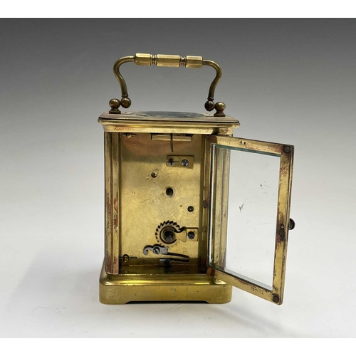 2934 - A French brass cased carriage timepiece, with white enamel dial, height 15cm.