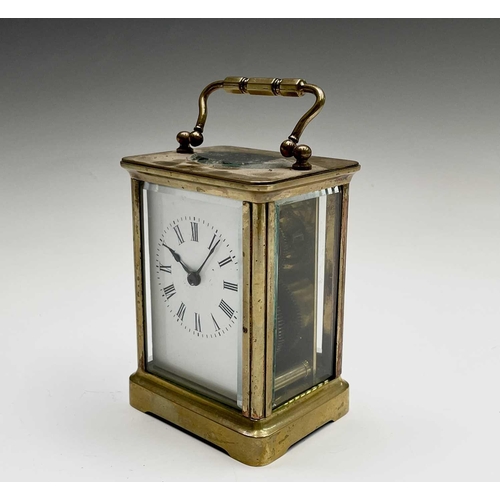 2934 - A French brass cased carriage timepiece, with white enamel dial, height 15cm.