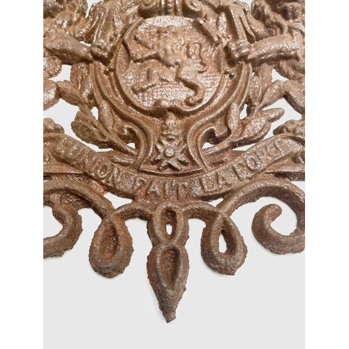 298 - A cast iron coat of arms, inscribed 'Union Fait La Force', width 36cm.