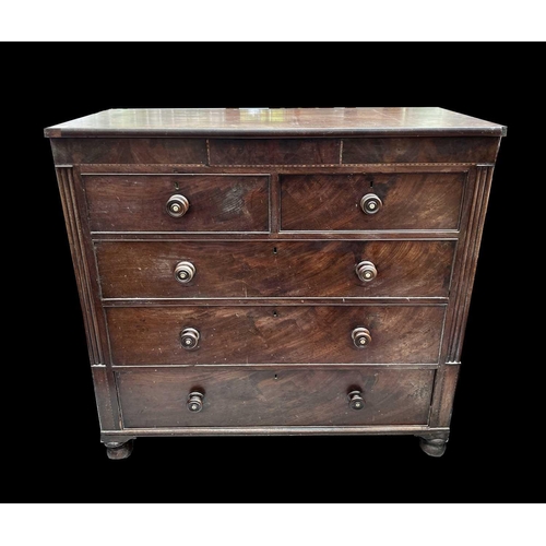 3009 - A Victorian mahogany chest of drawers, with a dummy central small frieze drawer above two short and ... 