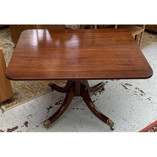 3013 - A George IV mahogany tilt top supper table, with rounded corners, on a tapering octagonal pillar and... 