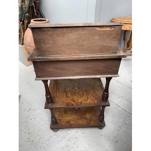 3014 - A Victorian inlaid walnut davenport, the hinged top with a fitted interior above two tiers joined by... 