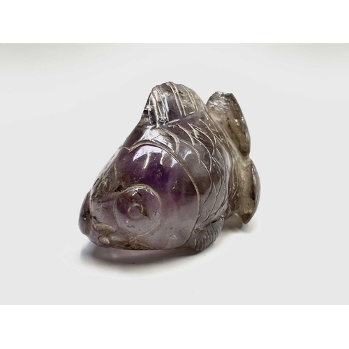 302 - A carved quartz sculpture of a dog, height 5.5cm, together with an agate figure of an eagle, and two... 