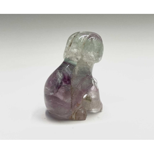 302 - A carved quartz sculpture of a dog, height 5.5cm, together with an agate figure of an eagle, and two... 