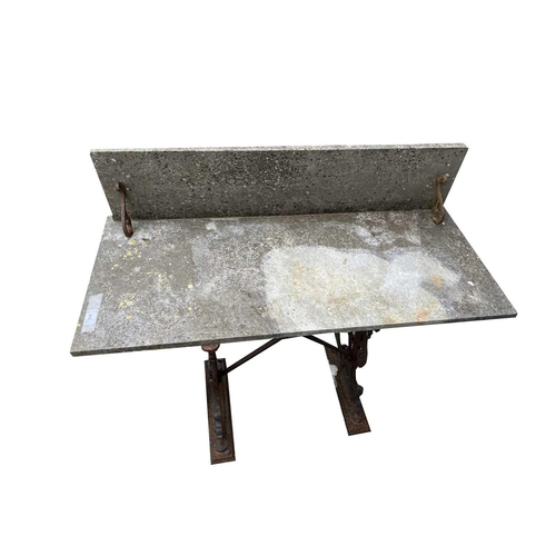 3020 - A Victorian cast iron stand with scroll and foliate decoration, fitted a marble top with raised back... 