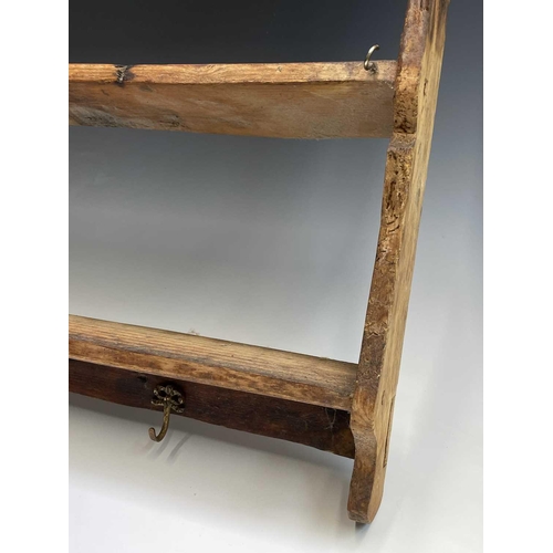 3021 - A Victorian pine plate rack. Height 73cm, width 67.5cm depth 12cm.