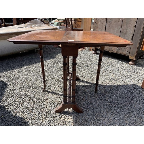 3026 - A Victorian burr walnut Sutherland table, raised on ring turned legs and stretcher. Height 66cm, wid... 