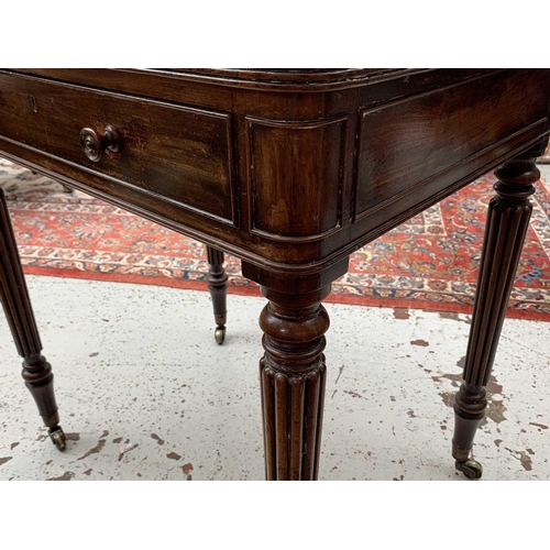 3029 - An early 19th century mahogany side table, in the manner of Gillows, the reeded top with a hinged co... 