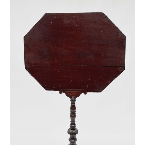 3030 - A Regency rosewood pole screen, with octagonal woolwork panel depicting an exotic bird amongst folia... 