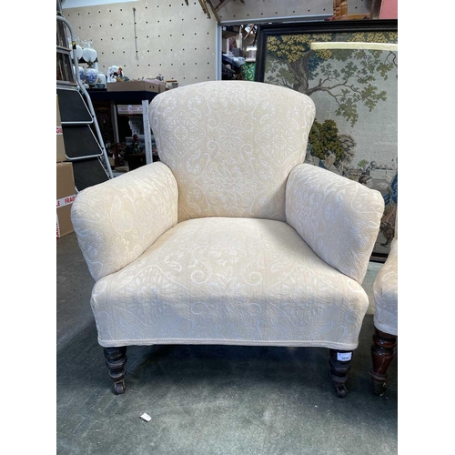 3031 - An Edwardian upholstered armchair on turned front legs, together with a Victorian mahogany nursing c... 