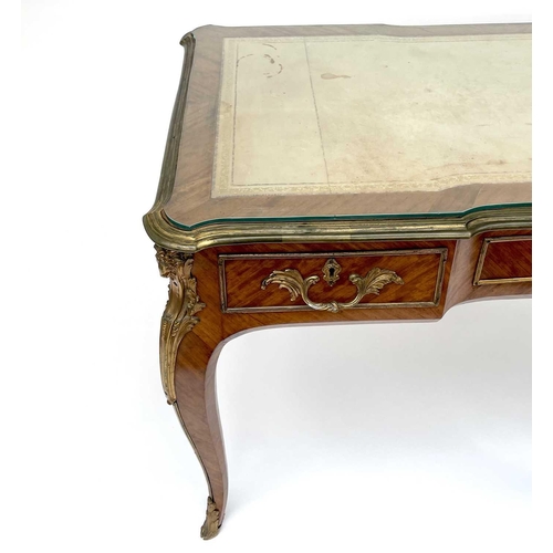 3039 - A Victorian bureau plat or desk, English in Louis XV style, kingwood veneered and with ornate gilt b... 