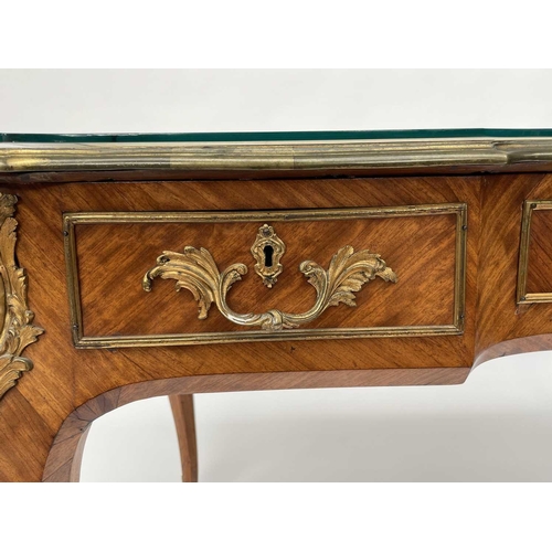 3039 - A Victorian bureau plat or desk, English in Louis XV style, kingwood veneered and with ornate gilt b... 