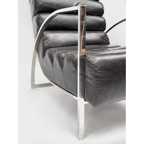 3041 - A contemporary leather and chrome open armchair, in the manner of the Jay Spectre 