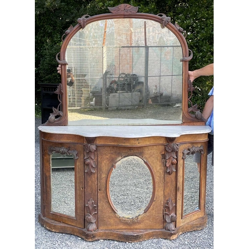 3046 - A Victorian walnut mirror back credenza, with applied carved decoration, the white marble top above ... 