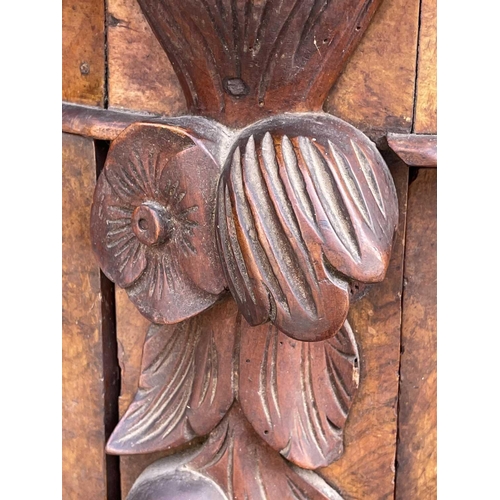 3046 - A Victorian walnut mirror back credenza, with applied carved decoration, the white marble top above ... 