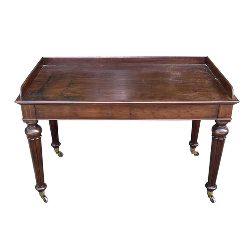 3049 - An early Victorian mahogany tray-top writing table or washstand, in the Gillows taste, fitted two fl... 