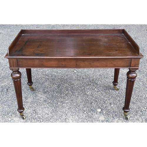 3049 - An early Victorian mahogany tray-top writing table or washstand, in the Gillows taste, fitted two fl... 