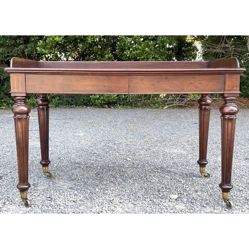 3049 - An early Victorian mahogany tray-top writing table or washstand, in the Gillows taste, fitted two fl... 