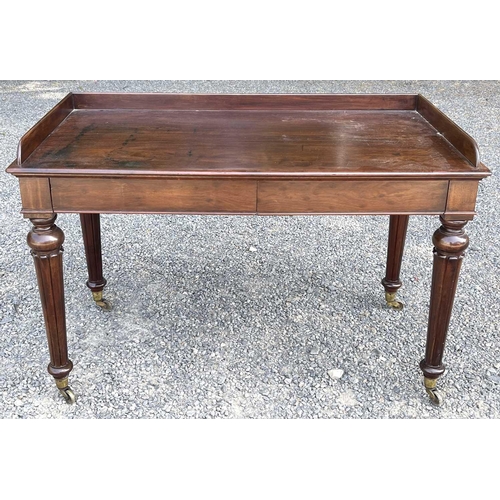 3049 - An early Victorian mahogany tray-top writing table or washstand, in the Gillows taste, fitted two fl... 