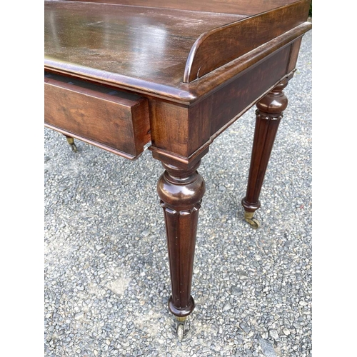 3049 - An early Victorian mahogany tray-top writing table or washstand, in the Gillows taste, fitted two fl... 