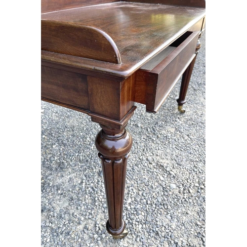 3049 - An early Victorian mahogany tray-top writing table or washstand, in the Gillows taste, fitted two fl... 