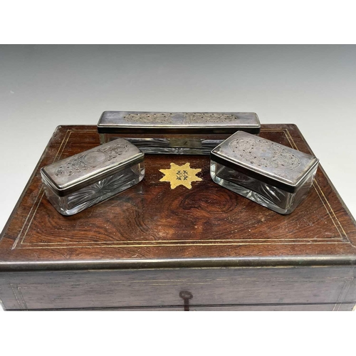 305 - A Victorian rosewood and brass inlaid vanity box, with partially fitted interior, width 32cm. Proven... 