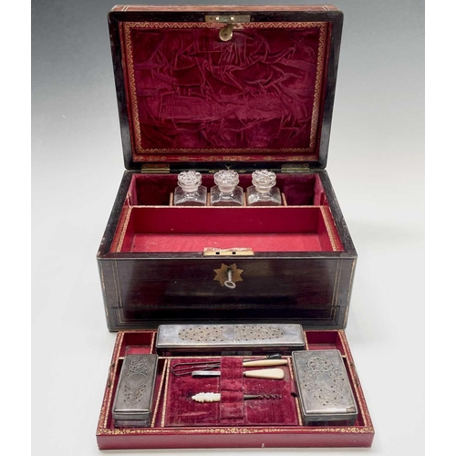 305 - A Victorian rosewood and brass inlaid vanity box, with partially fitted interior, width 32cm. Proven... 