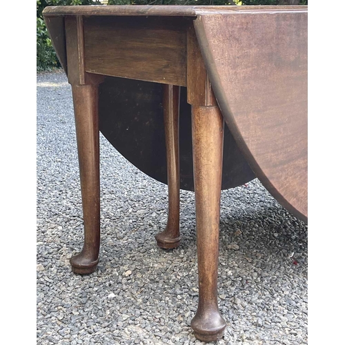 3050 - A George III mahogany dropleaf dining table, raised on five turned legs, with pad feet, height 72cm,... 