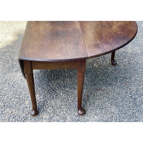 3050 - A George III mahogany dropleaf dining table, raised on five turned legs, with pad feet, height 72cm,... 