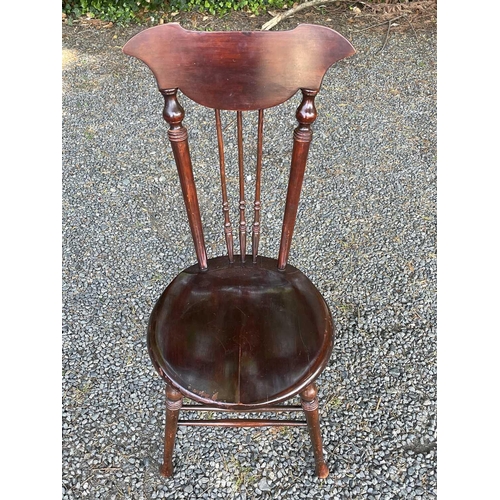 3052 - A Windsor type chair, possibly American, early 20th century, with circular 'penny' seat and shaped t... 