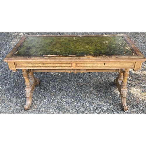 3058 - A Victorian walnut and inlaid Gothic style writing table, with leather inset skiver, within an inlai... 