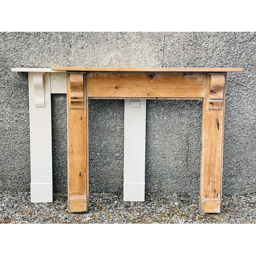 3062 - A late Victorian pine fire surround, height 112cm, width 142.5cm, together with a similar painted ex... 