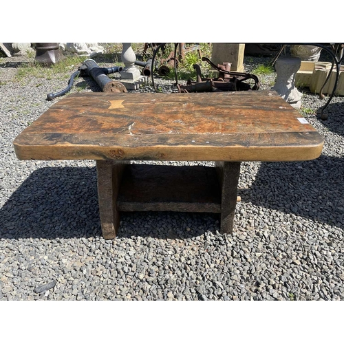 3065 - A rustic low table, made from reclaimed marine timber, raised on slab supports, height 43cm, width 8... 