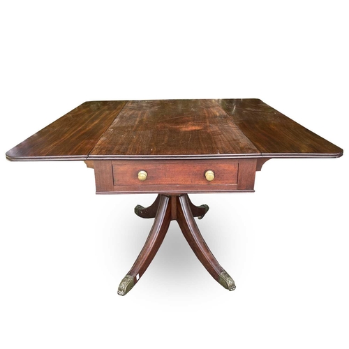 3067 - A Regency mahogany Pembroke table, fitted with a single end drawer, and raised on a turned central c... 