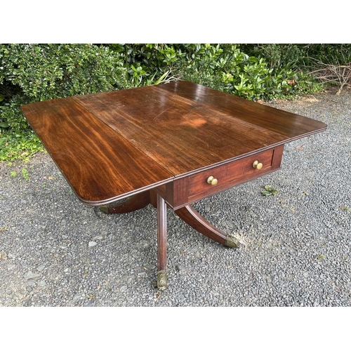 3067 - A Regency mahogany Pembroke table, fitted with a single end drawer, and raised on a turned central c... 